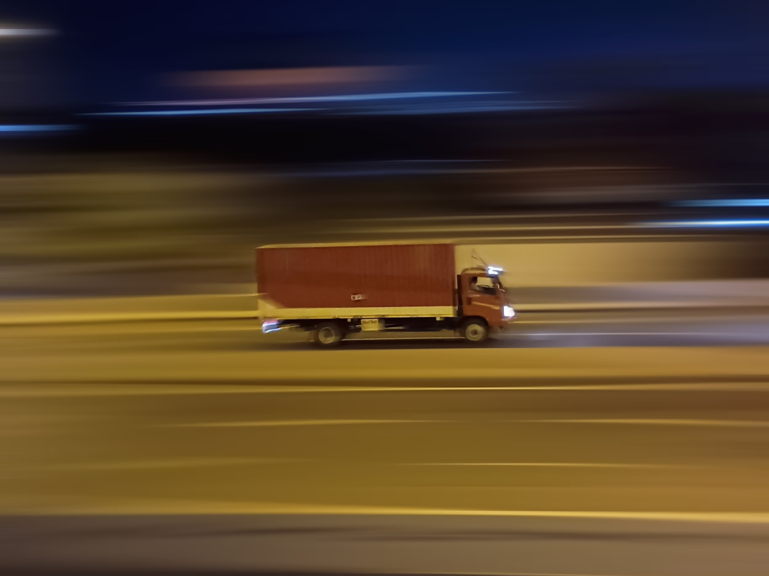 A Truck Speeding On The Highway